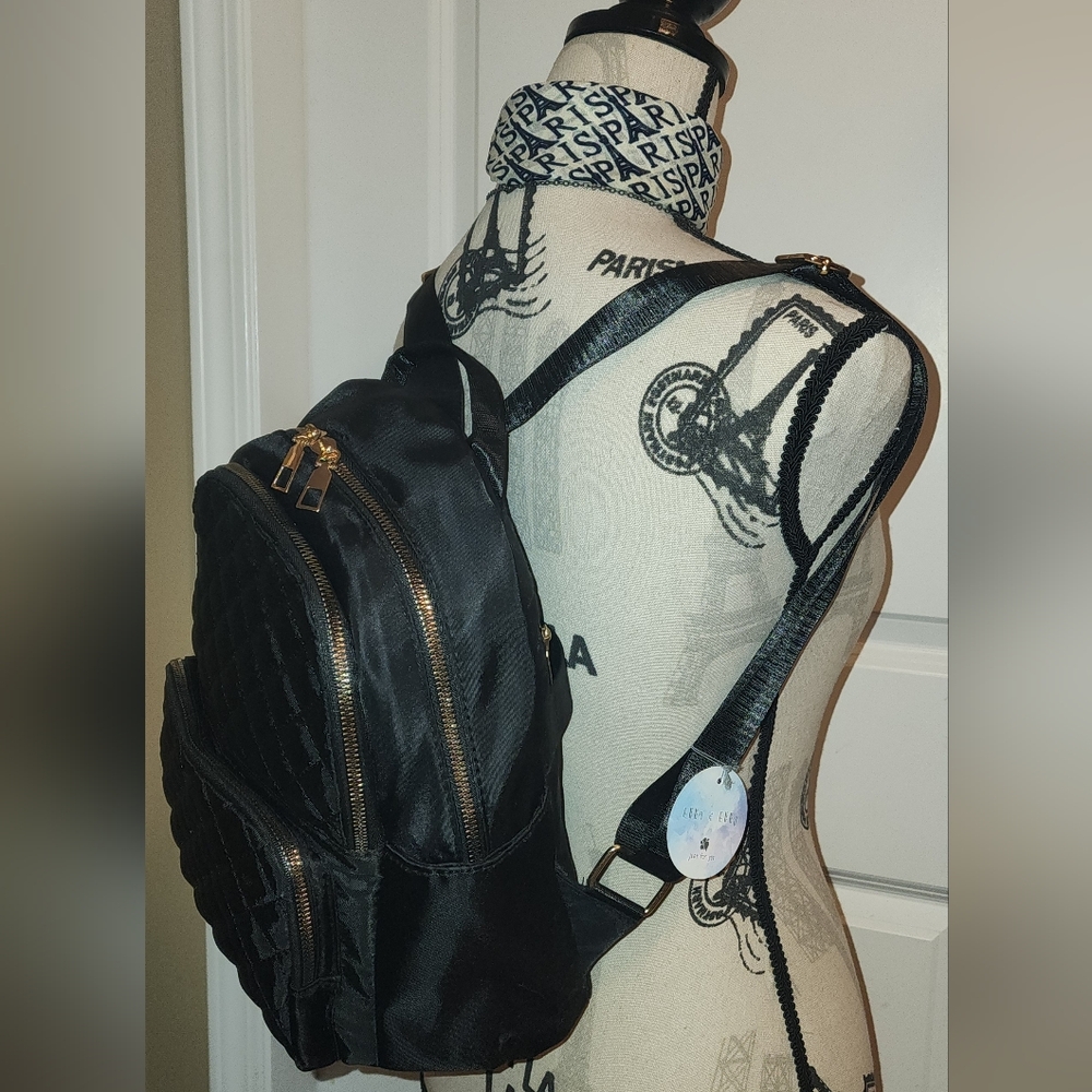 NWT Stylish Black Quilted Nylon With Metallic Gold Zippers Backpack